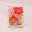 Greeting card with mushroom illustration and 'Trippin' Over You' text on a pink background