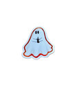 Ghost-shaped sticker on a wooden surface