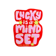 Lucky is a mindset sticker on crate background