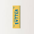 Yellowbutter bookmark spread love like butter with blue text on a white background