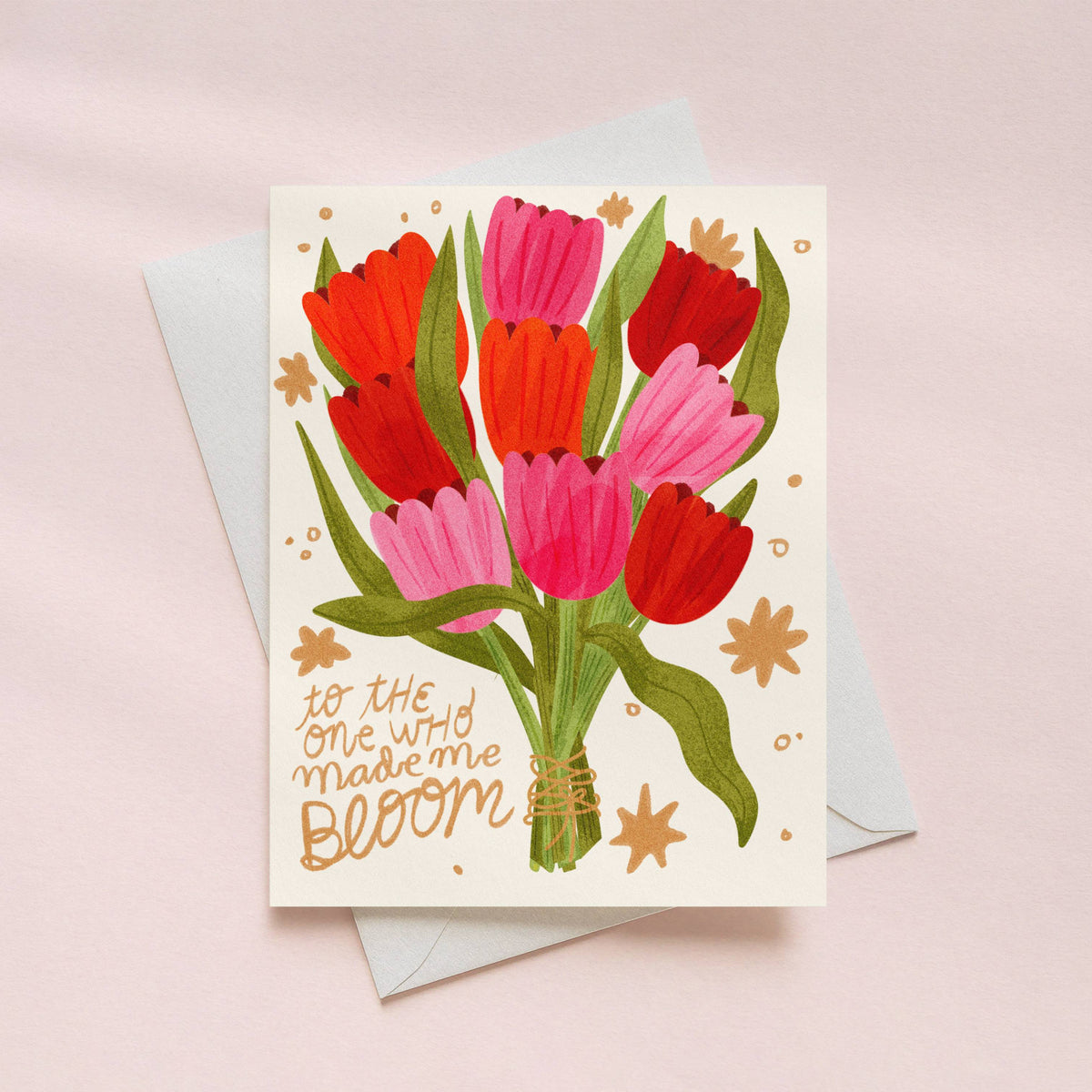 mothers day love Greeting card with red and pink tulips bouquet and text on a light pink background