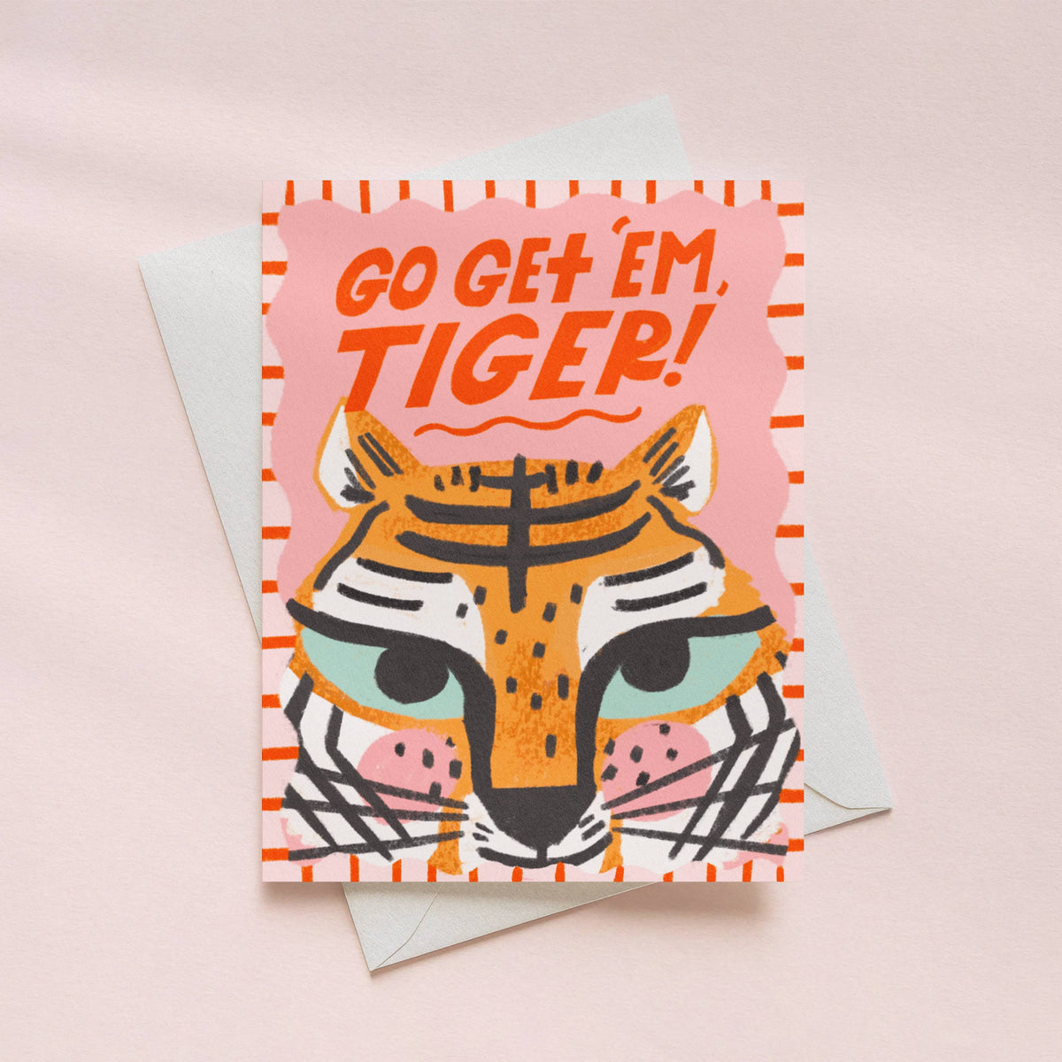 Greeting card with tiger illustration and 'Go Get 'em, Tiger!' text on a pink background