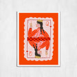 Framed artwork of a stylized card with a person on an orange background