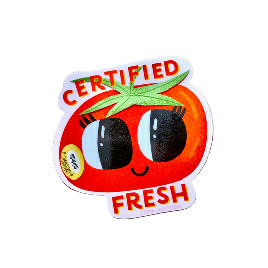Certified Fresh tomato sticker on a wooden surface