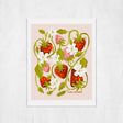 Framed artwork of strawberries and flowers on a light pink background