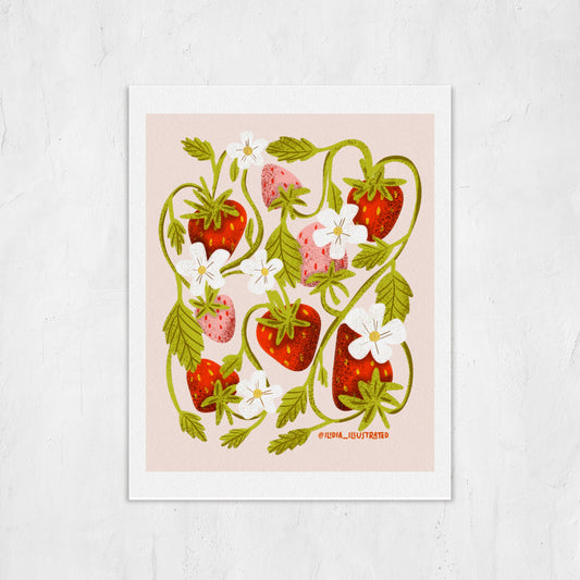 Framed artwork of strawberries and flowers on a light pink background