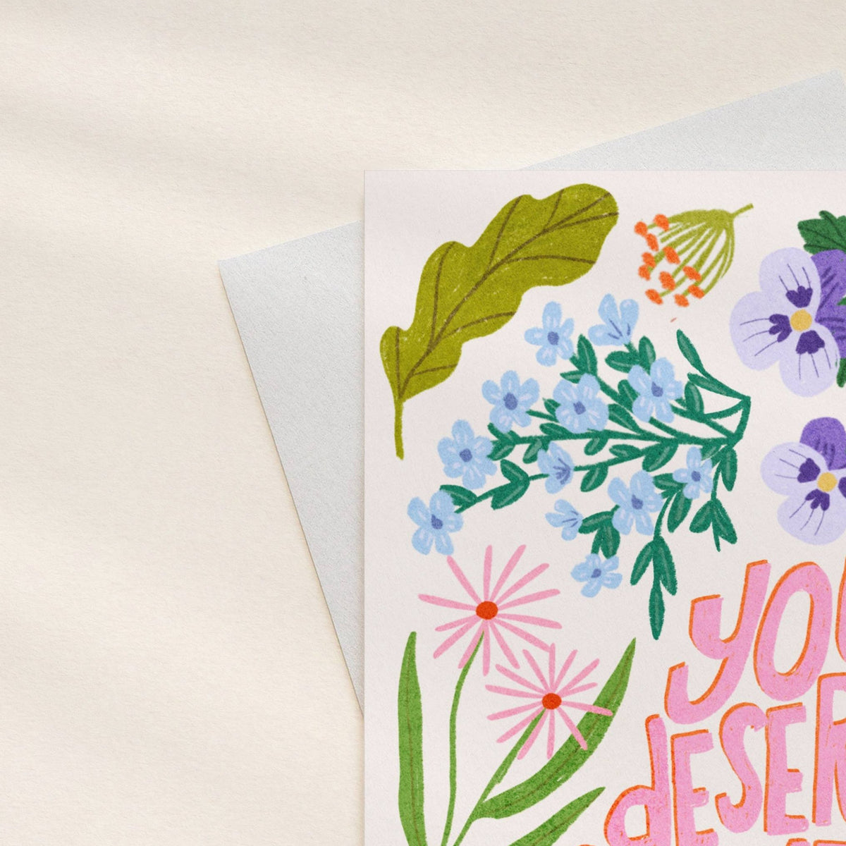 Greeting card with floral design and text on a white background