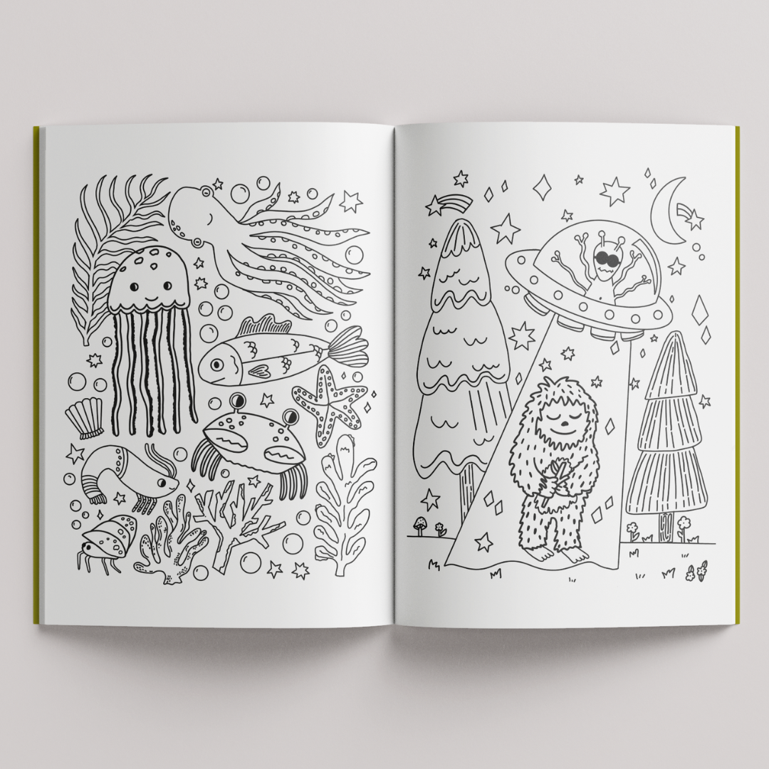 Open coloring book with black line art on a white background