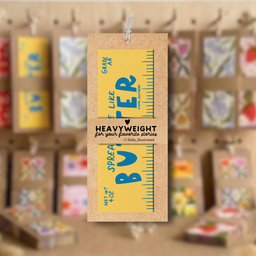 Cardboard box with text and graphics on a blurred background of similar boxes.